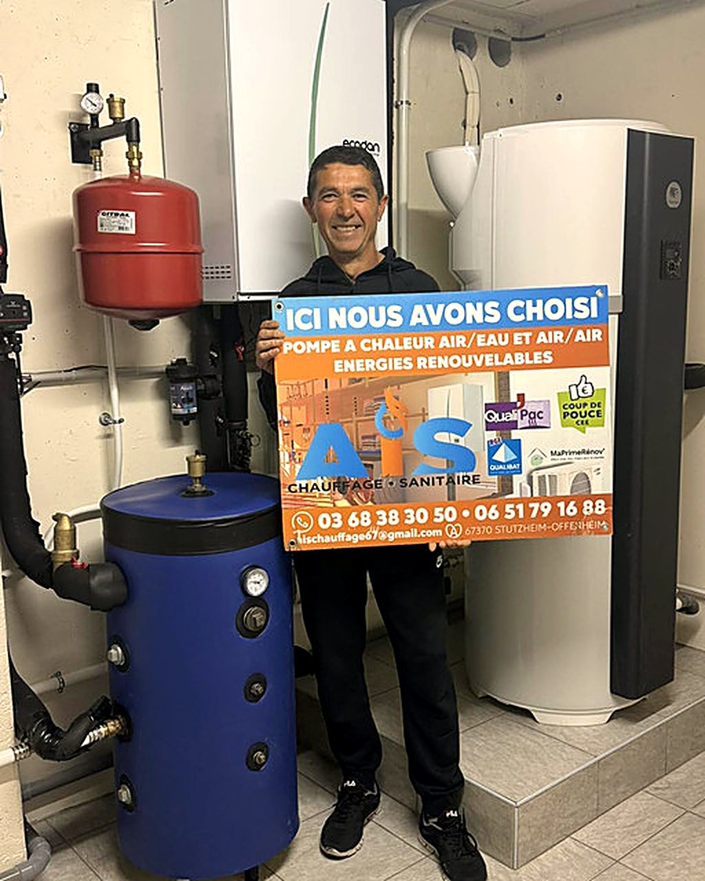 Équipe AIS Chauffage sur chantier installation PAC Strasbourg